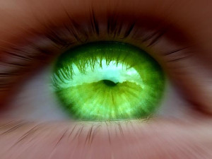 A green eye to signify jealousy.